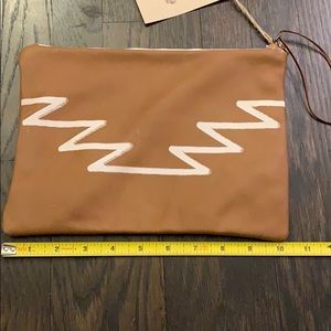 Authentic leather clutch bag. Brand new!